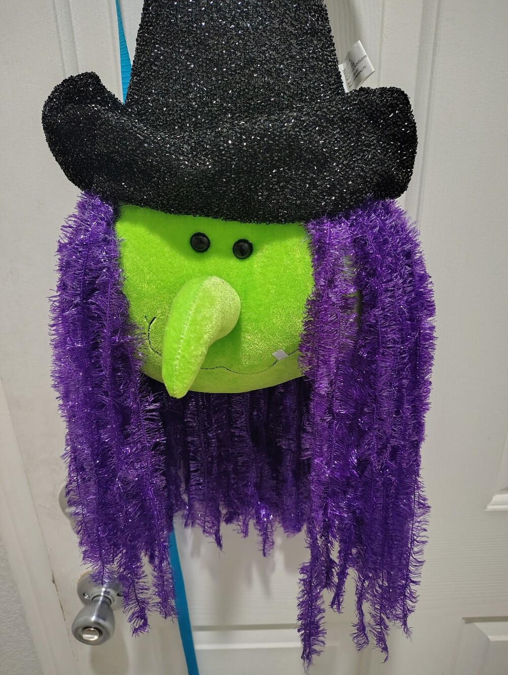 Kids Witch hanging decor with Green Face, Purple Hair & Black Sparkle hat.